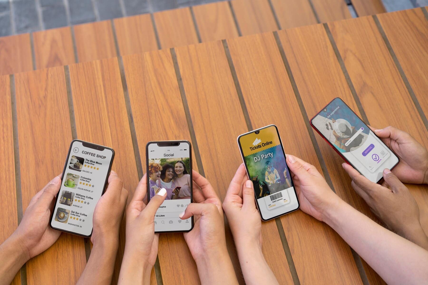 A group of diverse hands holding smartphones displaying apps for coffee shops, social media, event tickets, and online shopping.